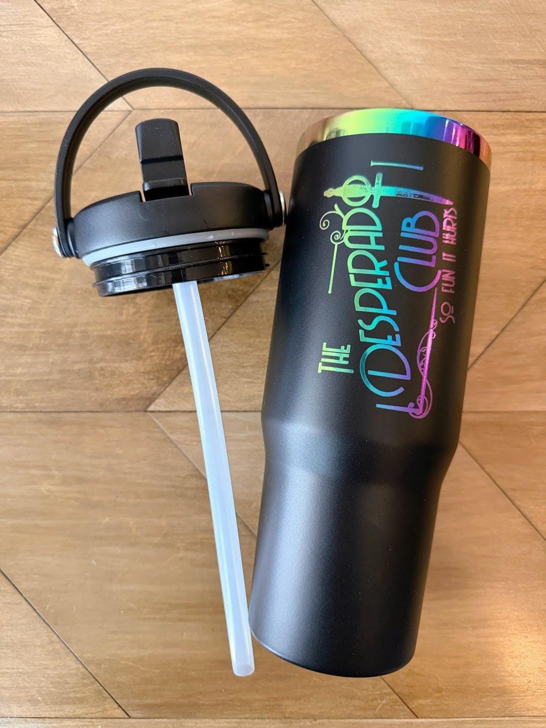 Dungeon Crawler Carl Tumbler | Desperado Club Dagger Design | 30oz Rainbow Engraved Cup | Black or White