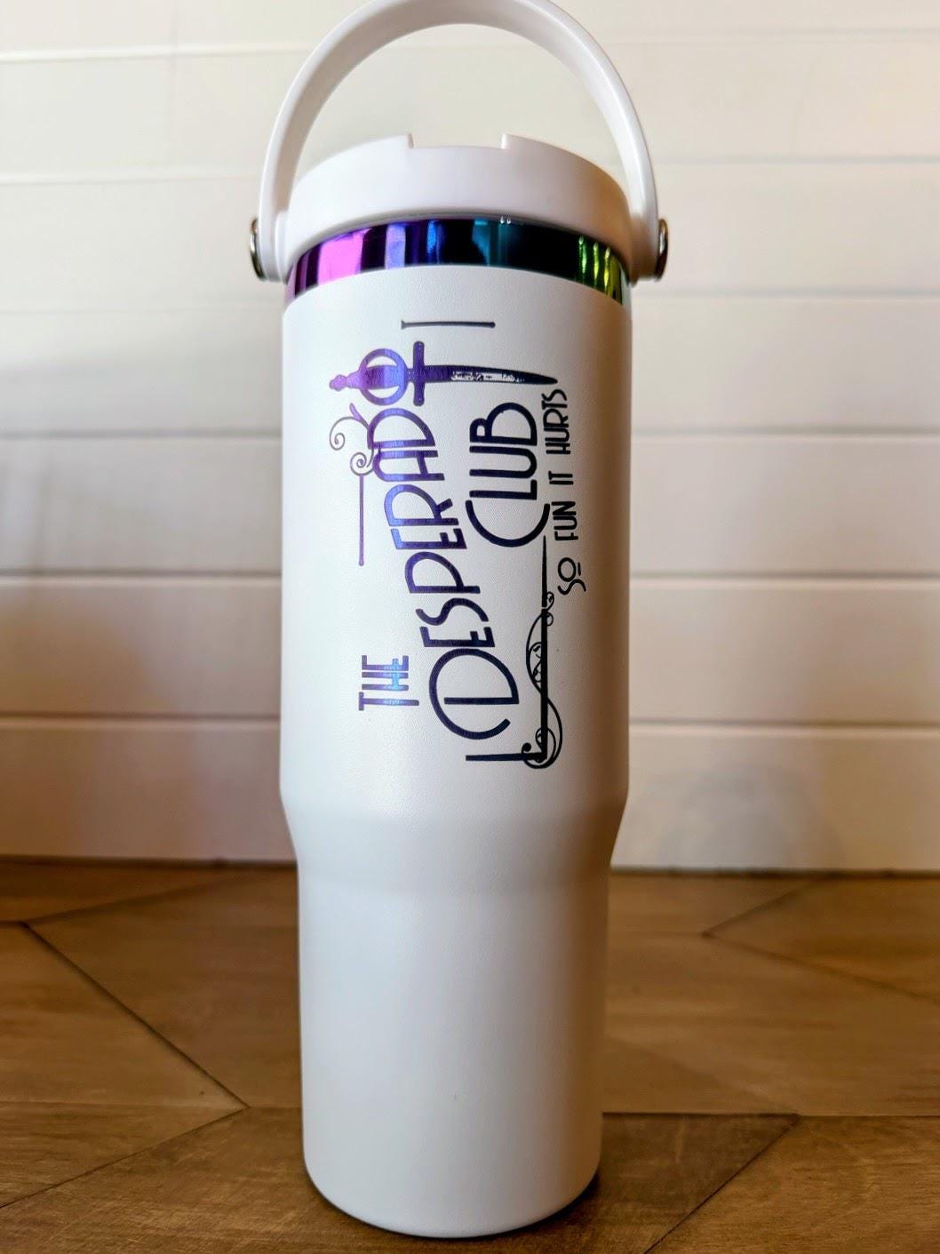 Dungeon Crawler Carl Tumbler | Desperado Club Dagger Design | 30oz Rainbow Engraved Cup | Black or White