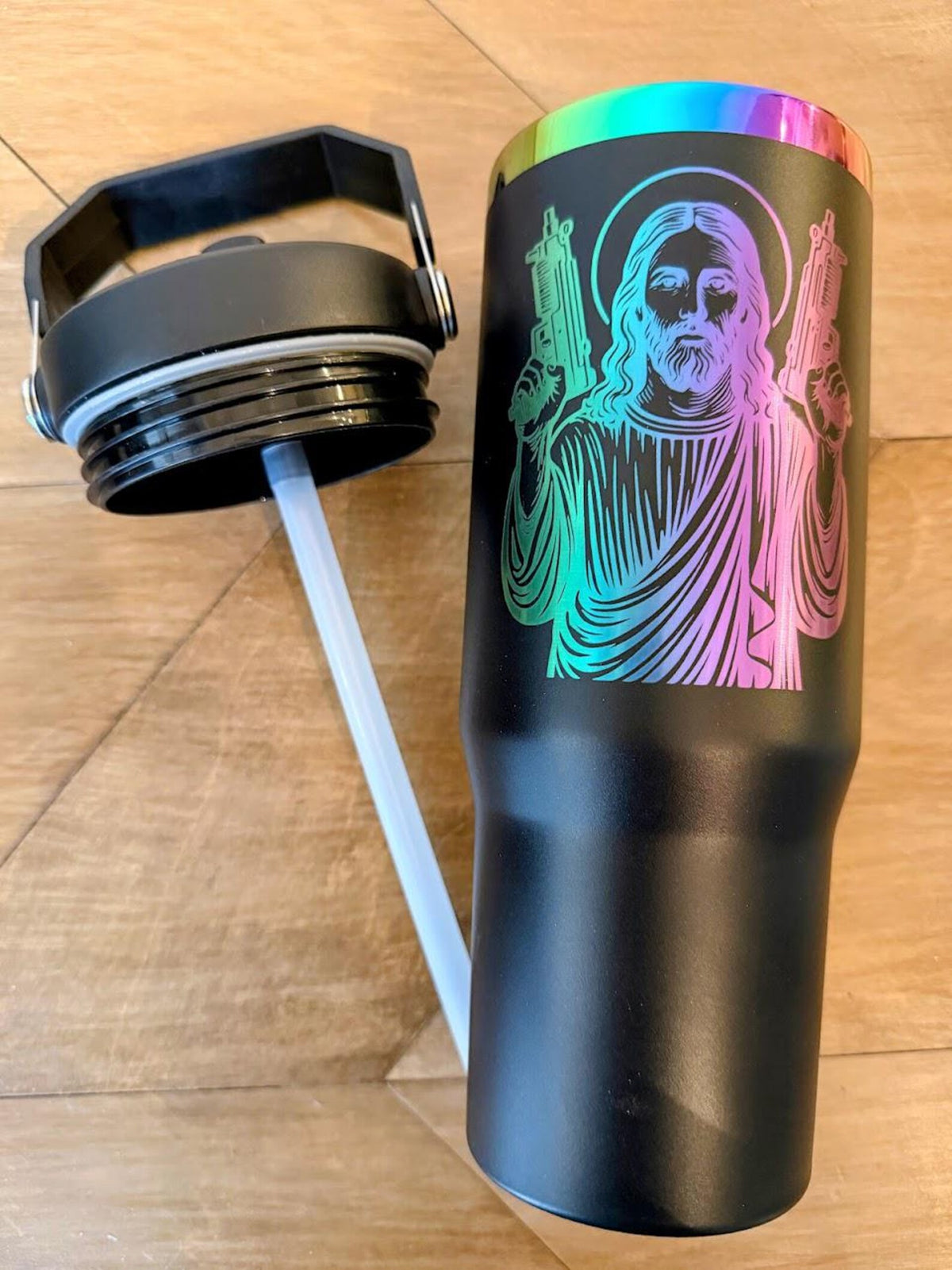 HeyZoos, Uzi Jesus Tumbler | Dungeon Crawler Carl | 20oz or 30oz Rainbow Engraved Cup | Black or White